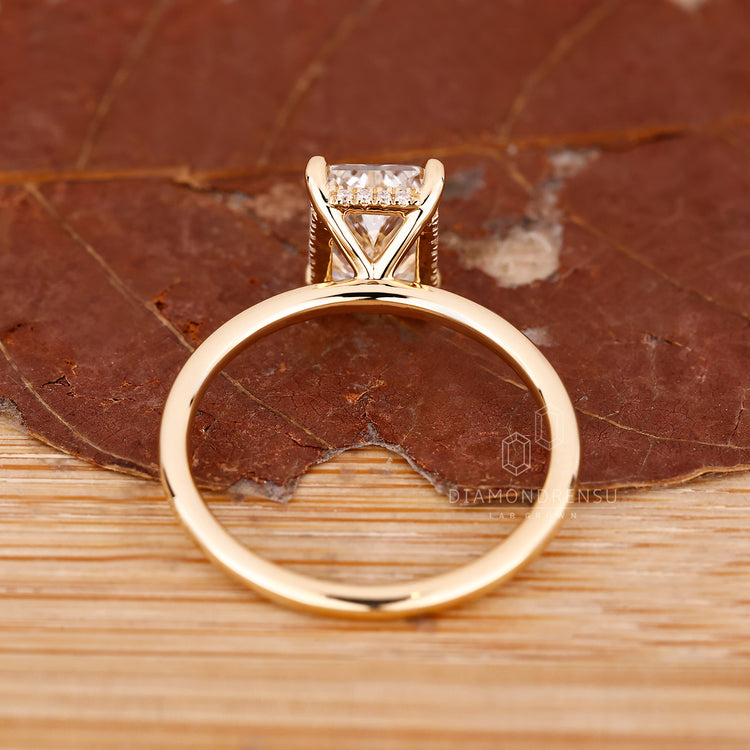 Hidden halo radiant cut diamond solitaire ring.