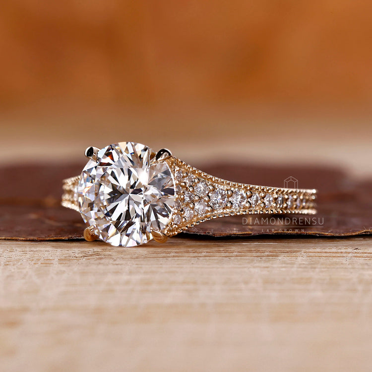 Lab grown round diamond ring tapered pave milgrain style.