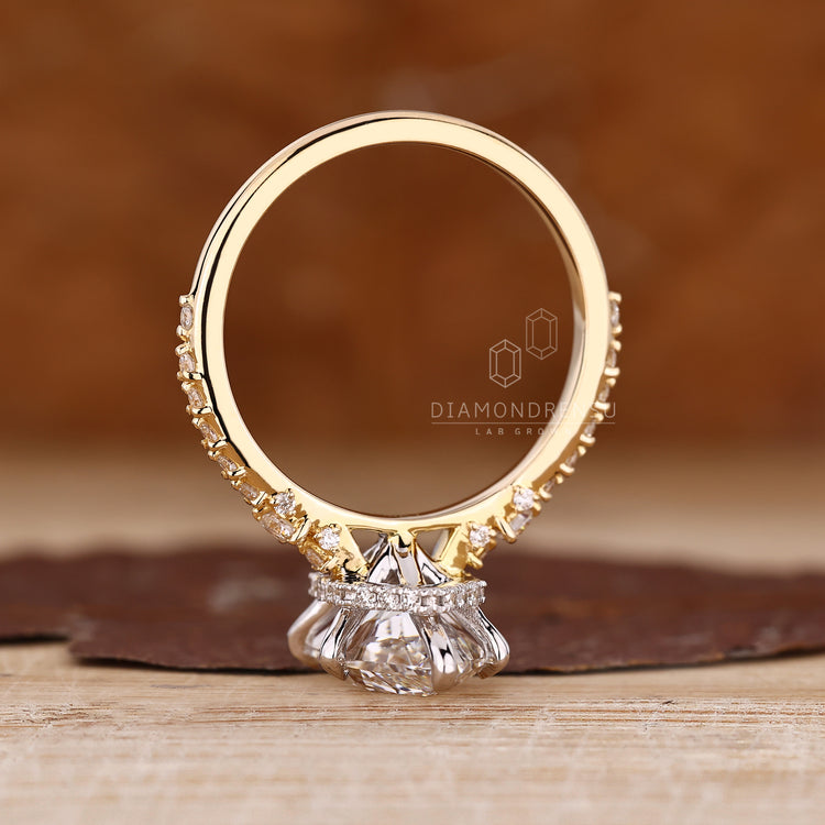 Marquise diamond ring hidden halo cathedral setting.