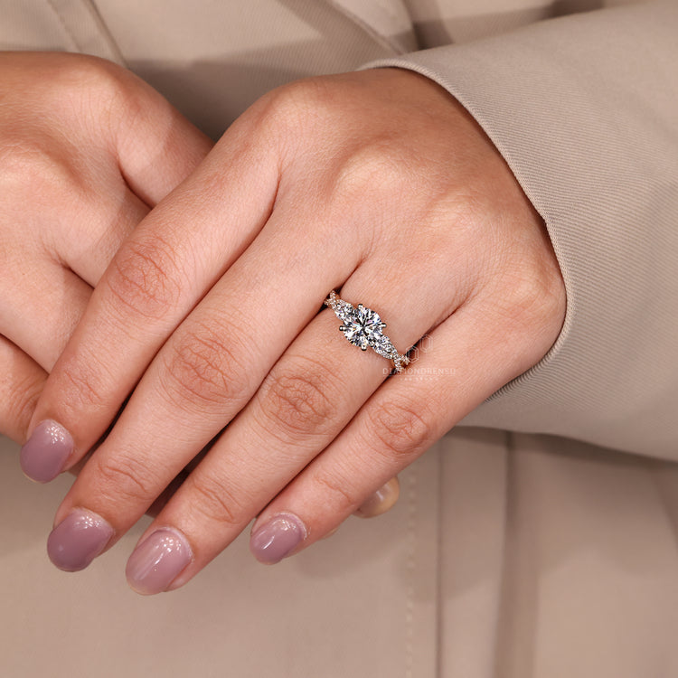 Round cut diamond ring IGI certified three stone.