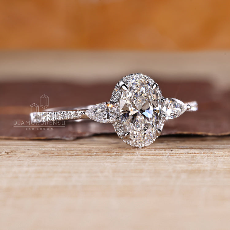 IGI certified oval cut diamond ring with halo setting.