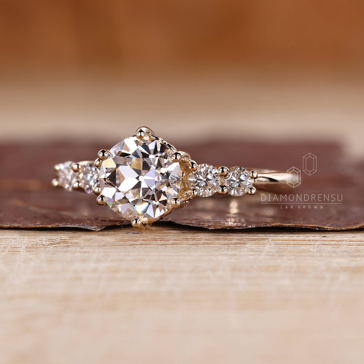Round old European cut ring six prong five stone style.