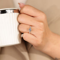 Five stone round old cut ring six prong side stones.