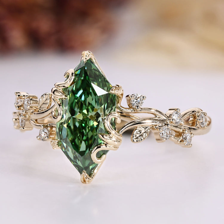 Dutch marquise diamond ring with round side stones.