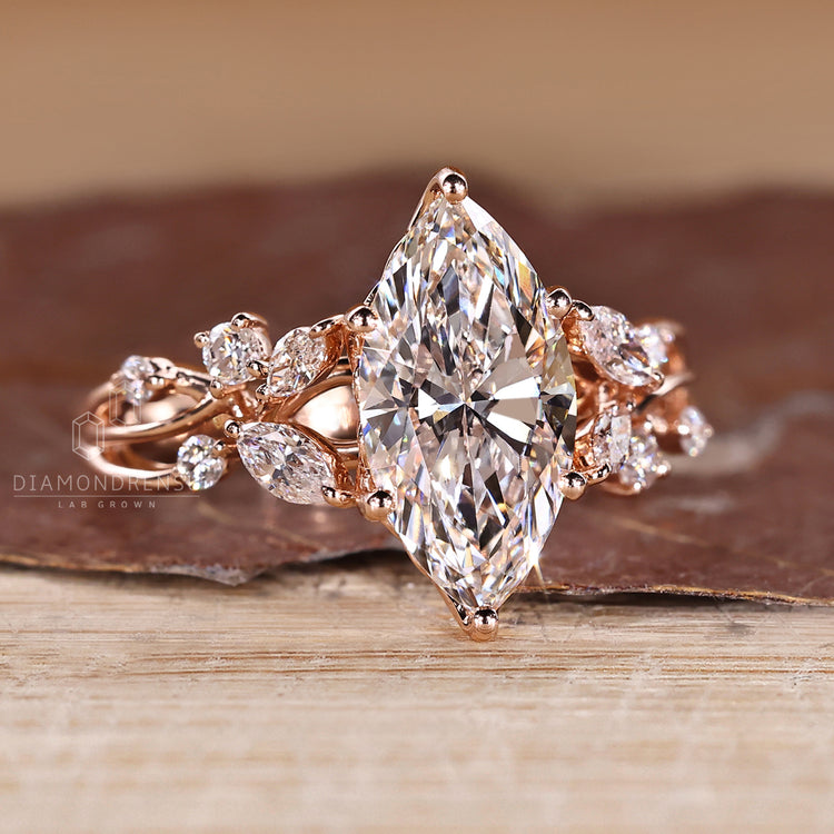 Marquise diamond ring six prong cluster setting.