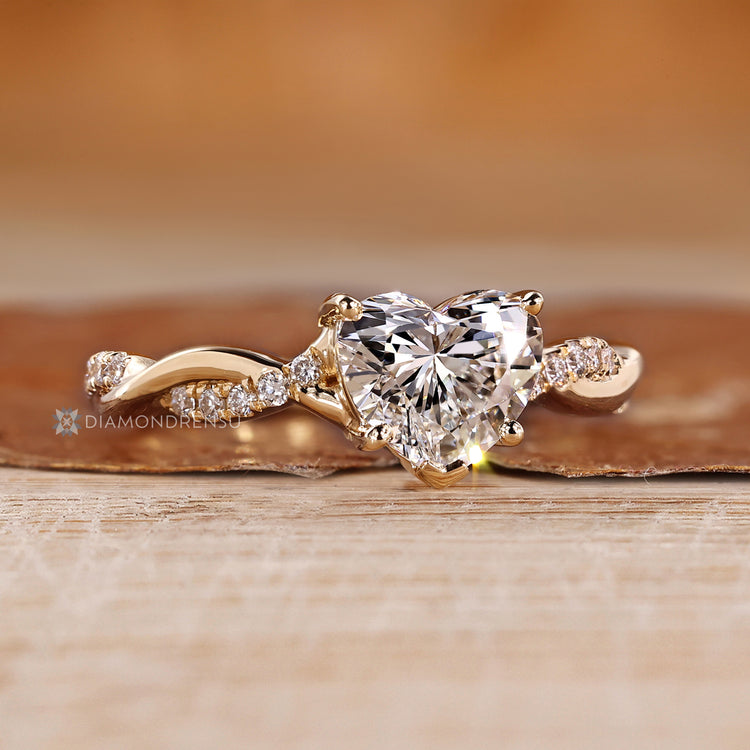 Heart diamond ring with twisted pave design.