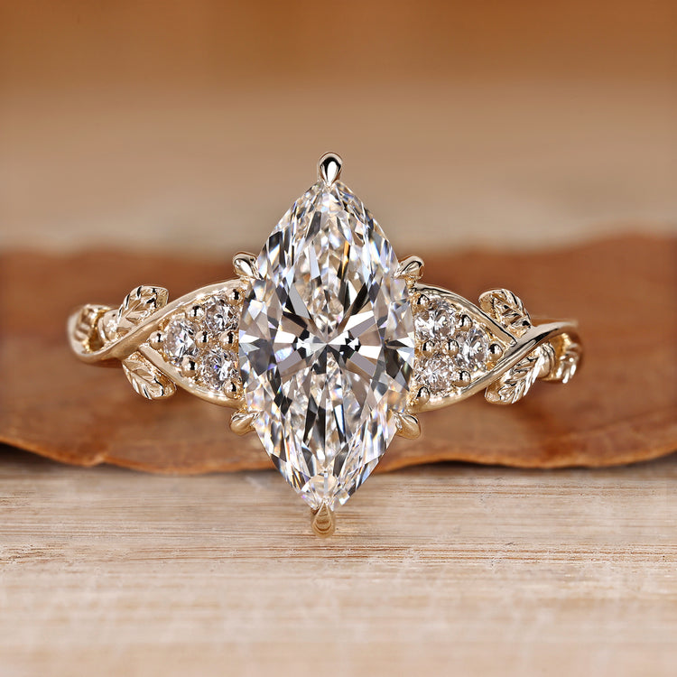 Marquise cut diamond ring seven stone style.