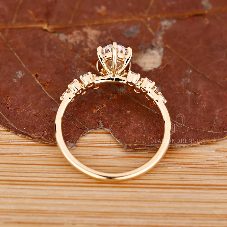 IGI certified oval diamond ring cluster setting.
