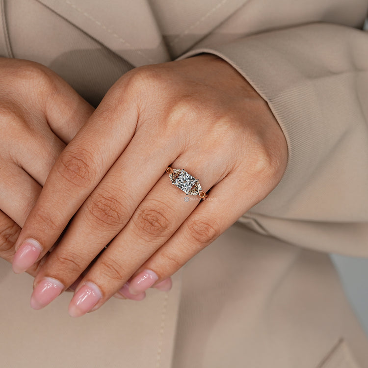 Princess diamond ring with four claw prong setting.