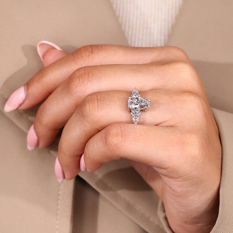 Coffin Cut Diamond Ring with a Four Prong Muse Setting.