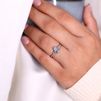 Pear cut ring v prong five claw seven stone style.