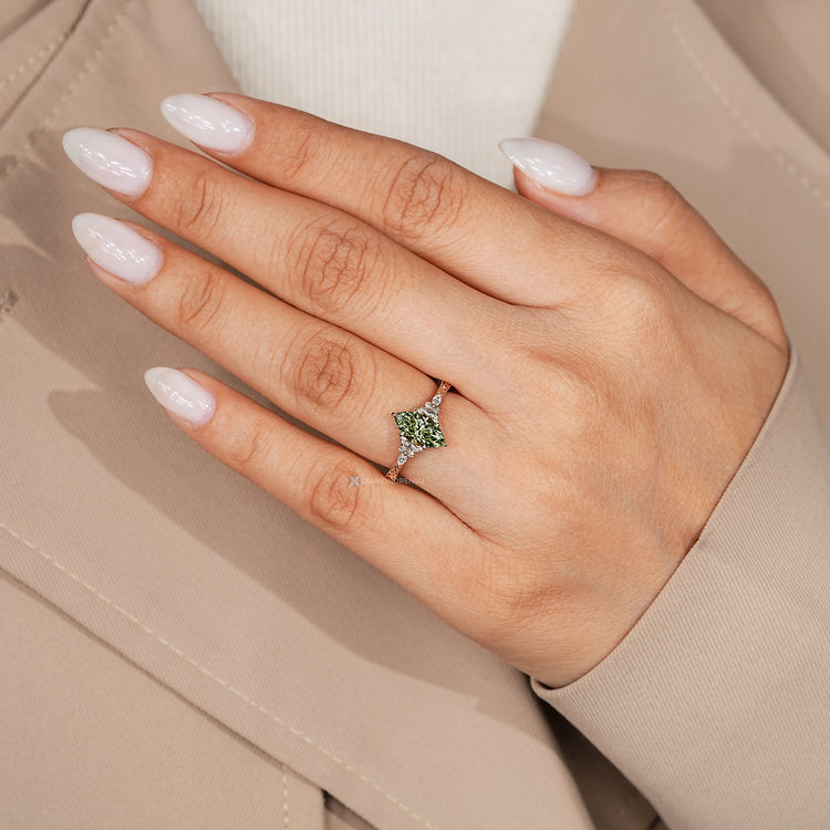 Marquise ring with six claw prongs and tulip basket.