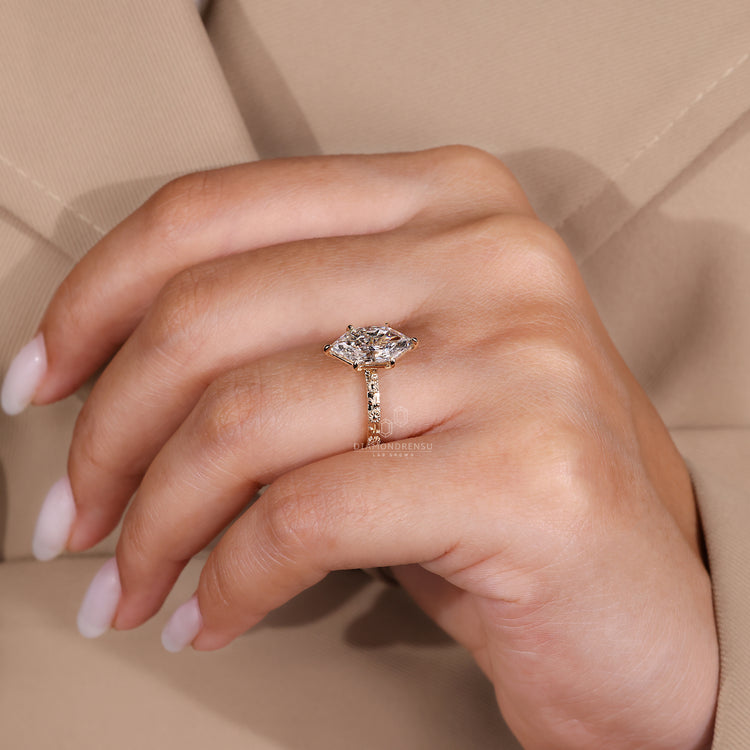 Dutch marquise ring sunflower detailing prong set.