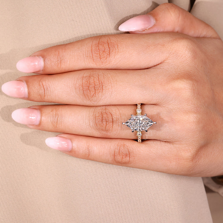 Marquise diamond ring cathedral six claw prong set.
