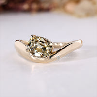 East to west cushion cut diamond engagement ring.