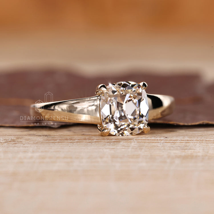 Cushion Old European Cut Ring four claw prong setting.
