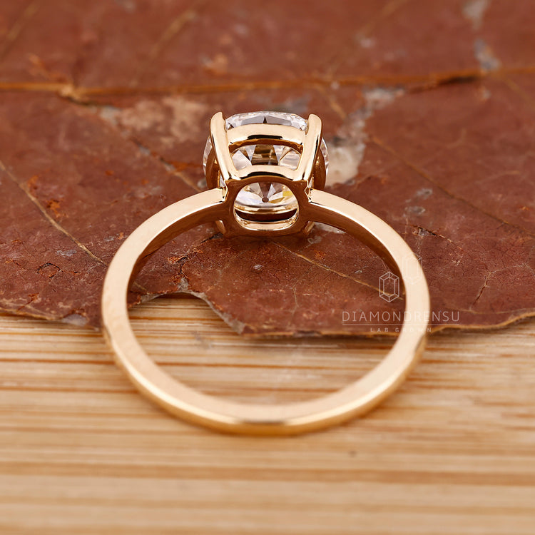 IGI certified cushion old cut ring four claw setting.
