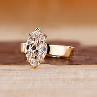 Diamondrensu AU handmade solitaire diamond engagement ring.