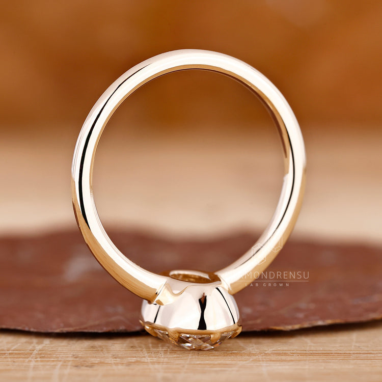 Oval old European cut ring eight claw prong style.