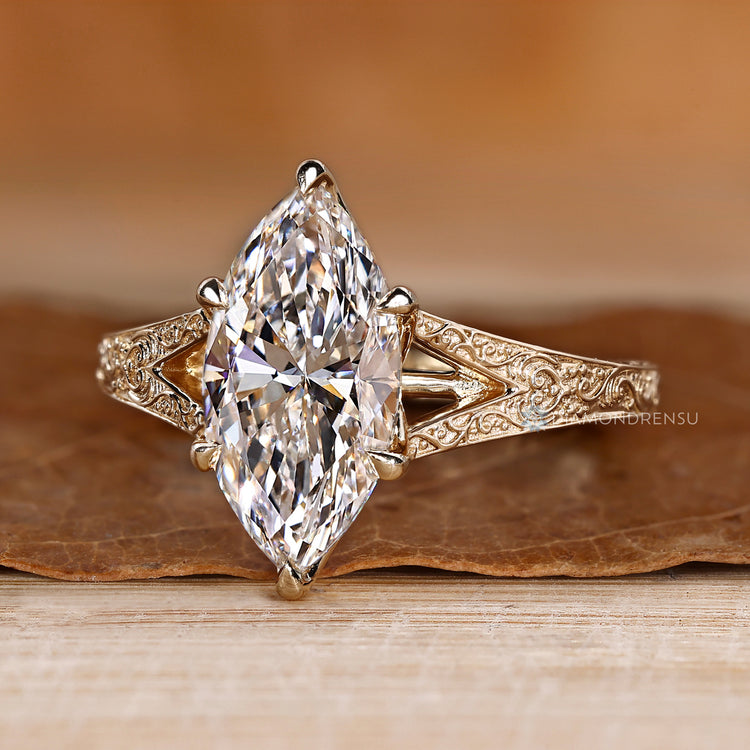 Marquise diamond ring with Art Deco detailing.