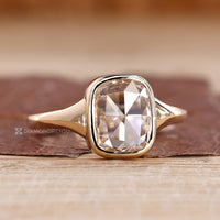 Solitaire cushion rose diamond ring bezel setting.