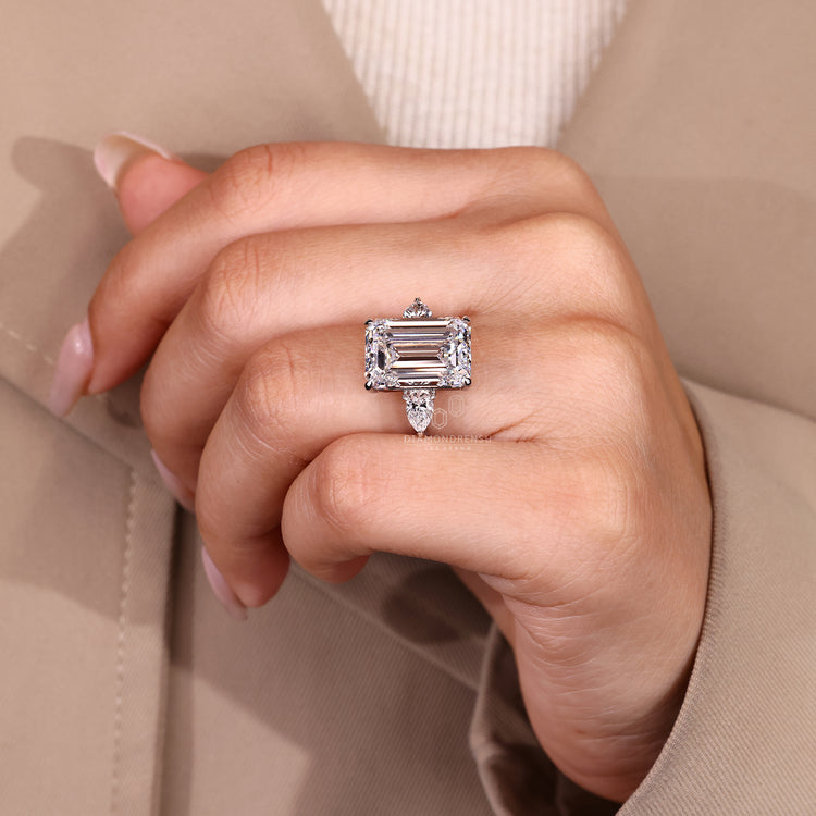 Emerald Cut Diamond Ring with two pear side stones.