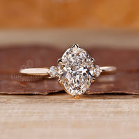 Lab grown oval diamond ring three stone style.