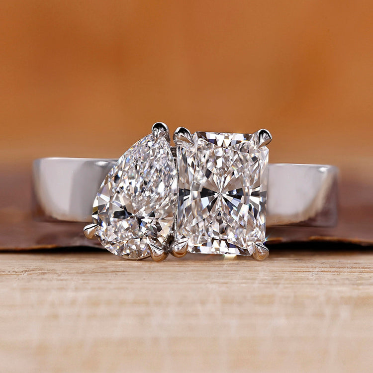 Toi et Moi diamond ring with radiant and pear cut diamonds.