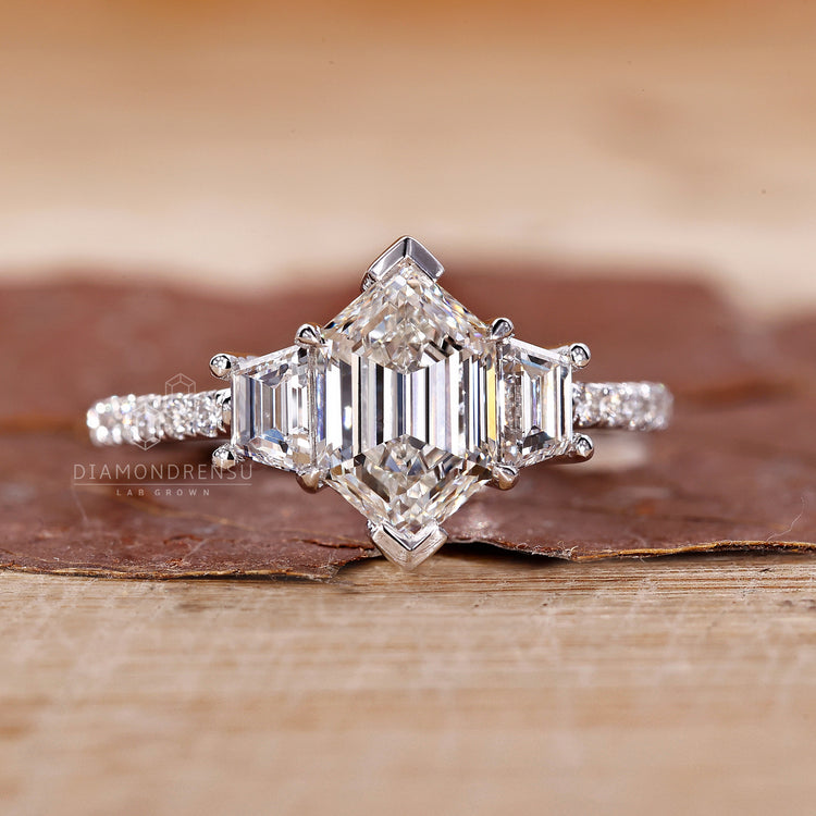 Handmade hexagon step cut diamond ring three stone design