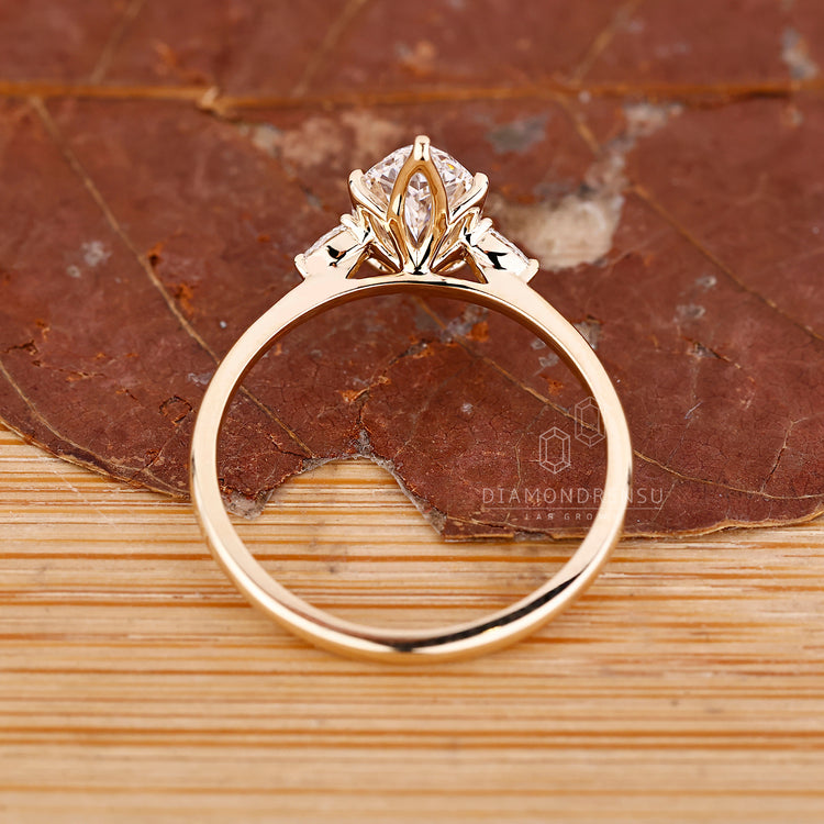 IGI certified marquise diamond ring tapered shank.