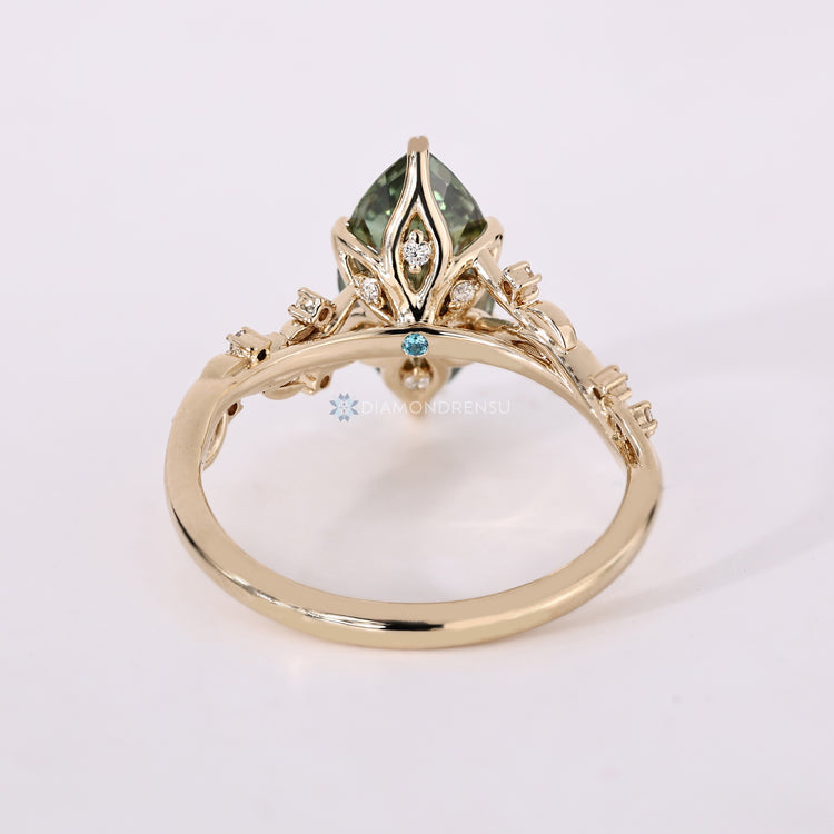 Lab grown marquise diamond ring with blue topaz.