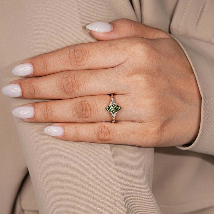 Art Deco marquise diamond ring with milgrain detail.