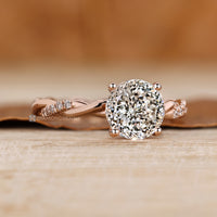 Portuguese diamond ring with four prong setting.