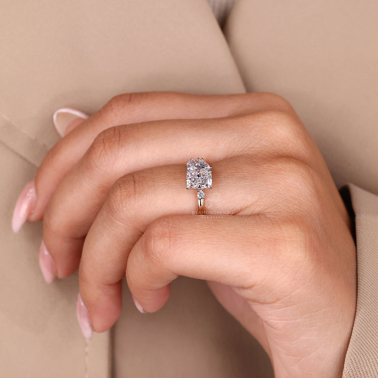 Pear radiant cut ring two stone split shank style.