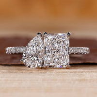 Toi et moi diamond ring pear radiant pave band style.