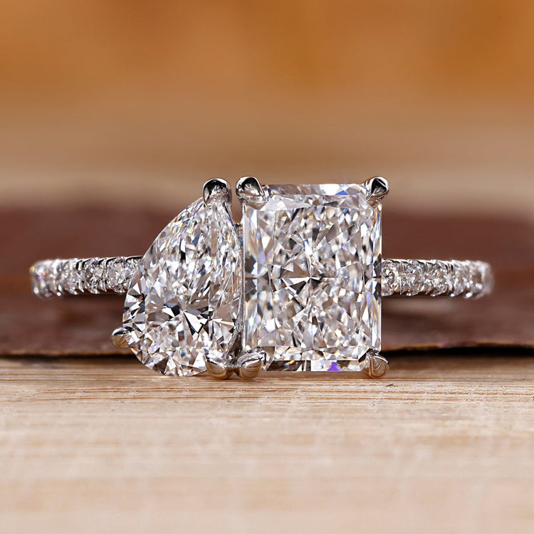 Toi et moi diamond ring pear radiant pave band style.