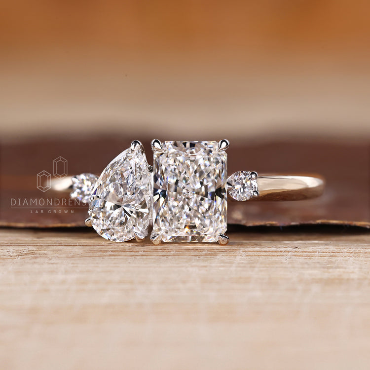 Lab grown pear radiant ring toi et moi two stone.