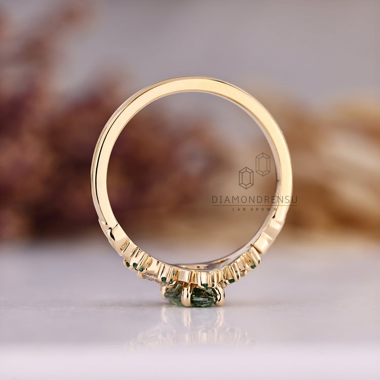 Marquise cut ring four prong cluster setting.
