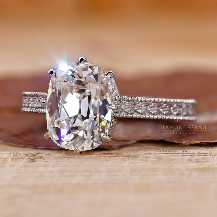 Cushion Old Mine Cut Ring eight claw prong setting.