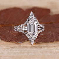 Vintage hexagon diamond ring pear round side stones.