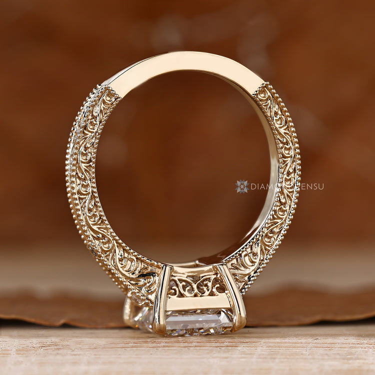 Art Deco princess cut diamond ring with milgrain.