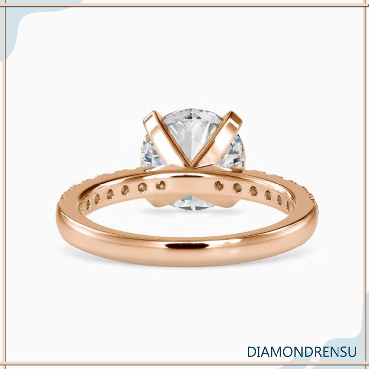 Handmade ring featuring a round brilliant cut diamond for unique craftsmanship.