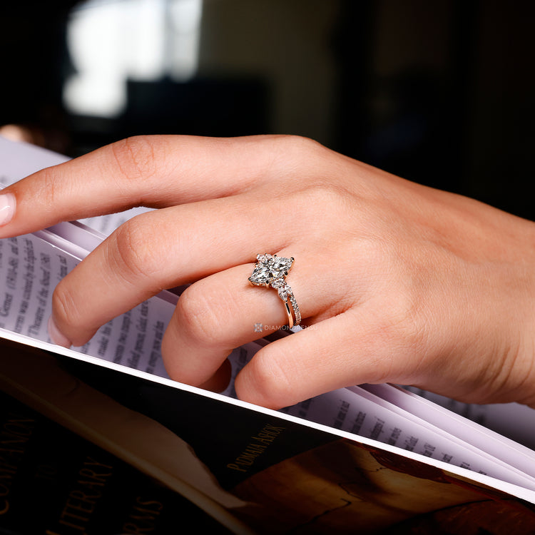 Marquise diamond ring with Muse setting and tapered shank.