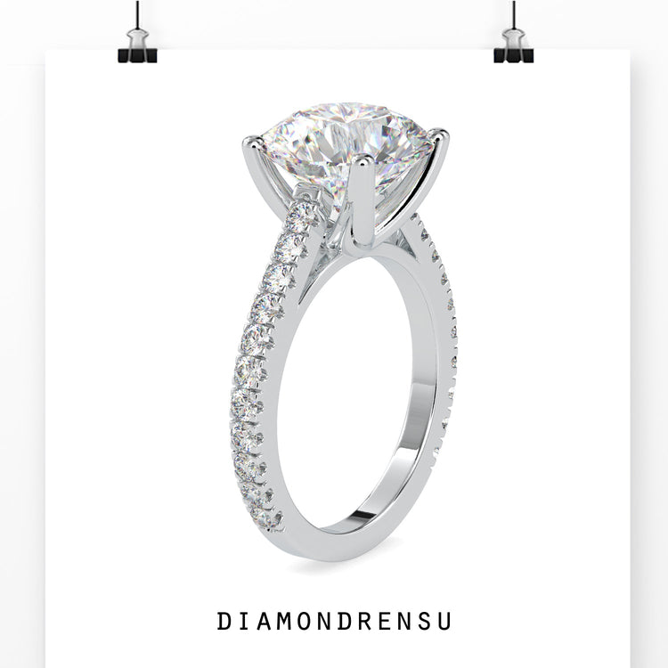 Round brilliant cut diamond ring with a 4 prong engagement ring setting.