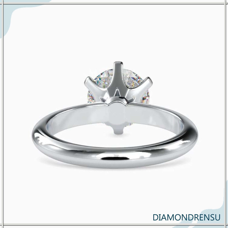 Round solitaire ring offering simplicity and timeless elegance.