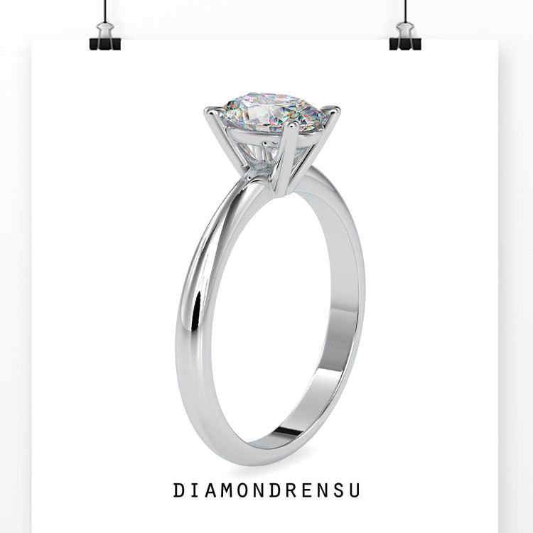 Gold solitaire oval engagement ring with stunning elegance and sparkle.
