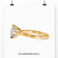 2 carat round cut diamond ring with a chic and modern twist.