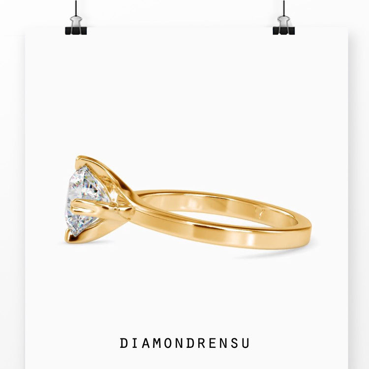 2 carat round cut diamond ring with a chic and modern twist.
