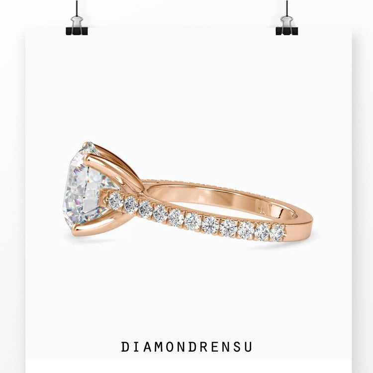 Lab grown diamond ring featuring a cathedral ring setting with a round diamond and pave design.