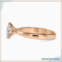 2 carat round cut diamond ring in an elegant pave setting.